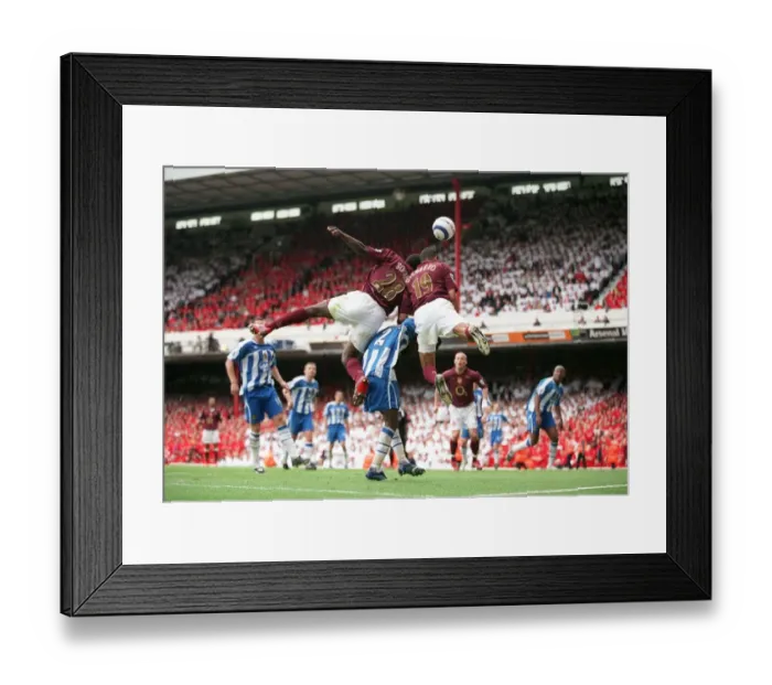 Framed Print : Gilberto and Kolo Toure (Arsenal) jump for the ball with Pascal Chimbonda (Wigan) Framed Print : Gilberto and Kolo Toure (Arsenal) jump for the ball with Pascal Chimbonda (Wigan)