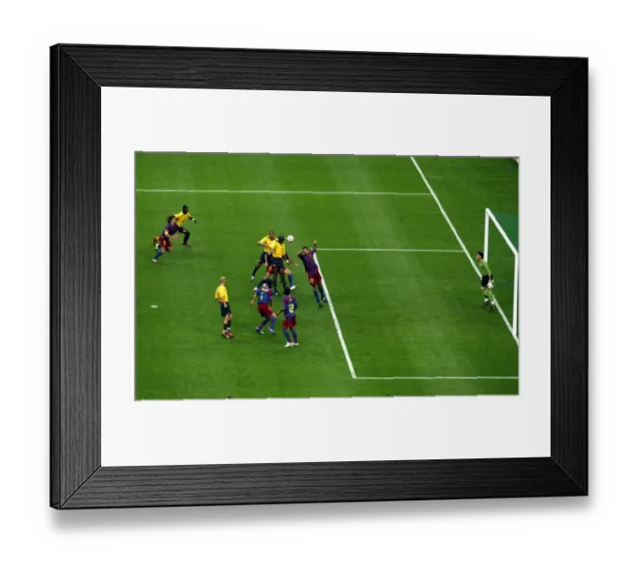 Framed Print : Sol Campbell's Heading Victory: Arsenal's Unforgettable Goal vs. Barcelona in the 2006 Champions League Final Framed Print : Sol Campbell's Heading Victory: Arsenal's Unforgettable Goal vs. Barcelona in the 2006 Champions League Final