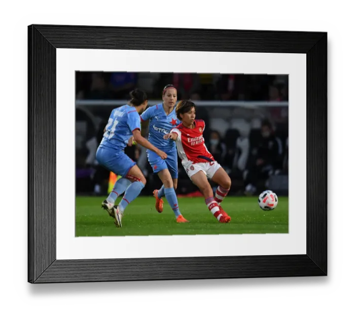 Framed Print : Arsenal vs Slavia Prague: Tense Battle in UEFA Women's Champions League