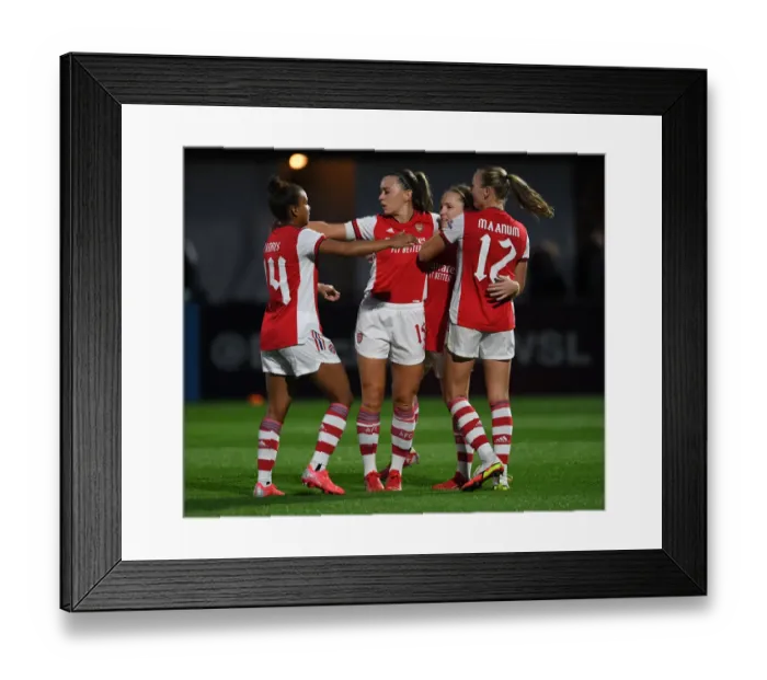 Framed Print : Arsenal Women Celebrate Kim Little's Goal in UEFA Women's Champions League Against Slavia Prague