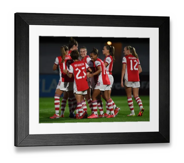 Framed Print : Arsenal Women Celebrate Kim Little's Goal in UEFA Women's Champions League