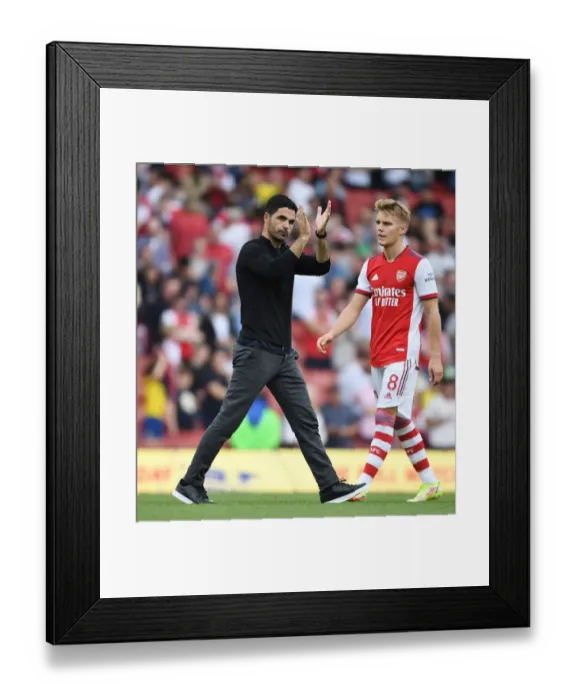 Framed Print : Arsenal's Mikel Arteta Celebrates with Fans After Victory over Norwich City