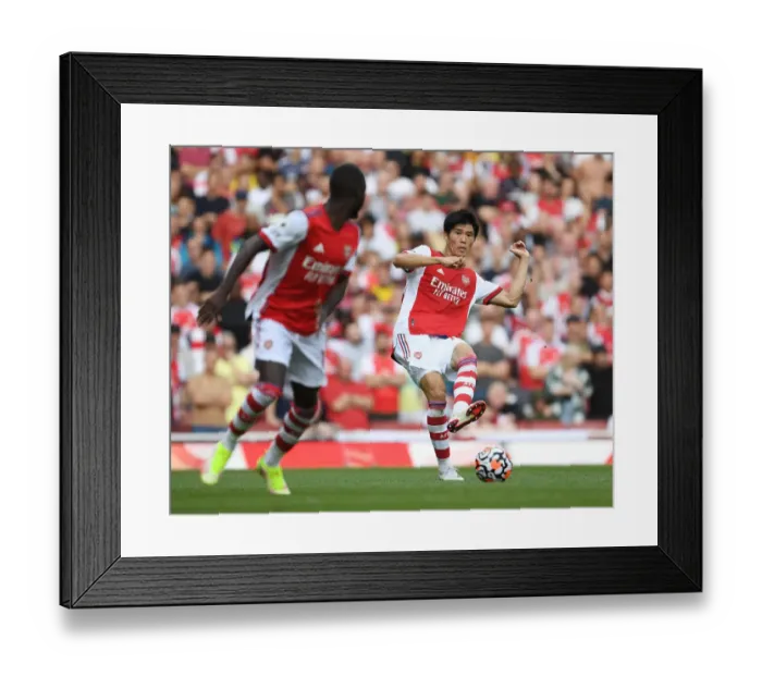 Framed Print : Arsenal's Tomiyasu Stands Out: Arsenal vs. Norwich City (Premier League 2021-22)