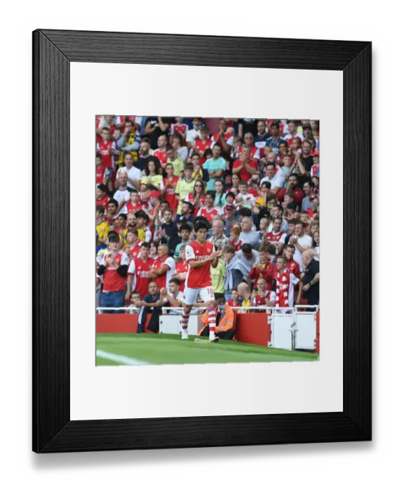 Framed Print : Tomiyasu Applauds Arsenal Fans After Substitution in Arsenal vs. Norwich City Match Framed Print : Tomiyasu Applauds Arsenal Fans After Substitution in Arsenal vs. Norwich City Match