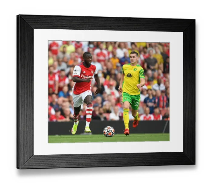 Framed Print : Pepe's Slick Moves: Outmaneuvering McLean in Arsenal's Triumph over Norwich