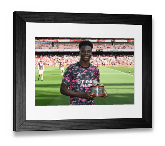 Framed Print : Arsenal's Bukayo Saka Receives Player of the Season Award vs Norwich City Framed Print : Arsenal's Bukayo Saka Receives Player of the Season Award vs Norwich City