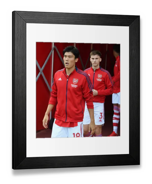 Framed Print : Arsenal's Tomiyasu Ready for Norwich City Clash in Premier League Framed Print : Arsenal's Tomiyasu Ready for Norwich City Clash in Premier League