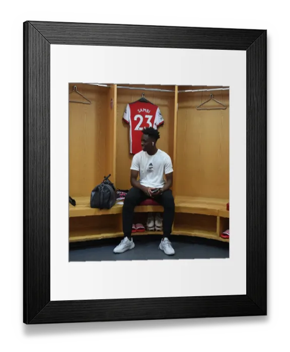 Framed Print : Arsenal's Sambi Lokonga in the Calm Before the Storm: Arsenal Changing Room, vs Norwich City, Premier League 2021-22