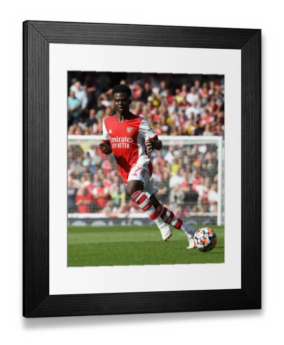 Framed Print : Arsenal's Bukayo Saka Shines: Arsenal vs Norwich City, Premier League 2021-22 Framed Print : Arsenal's Bukayo Saka Shines: Arsenal vs Norwich City, Premier League 2021-22