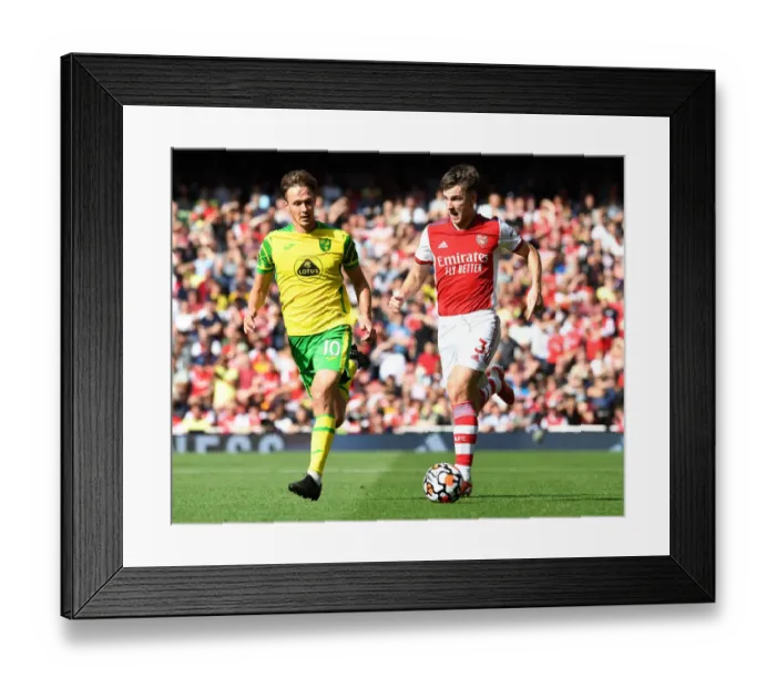 Framed Print : Arsenal vs Norwich City: Tierney Clashes with Dowell in Premier League Showdown Framed Print : Arsenal vs Norwich City: Tierney Clashes with Dowell in Premier League Showdown