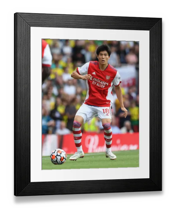Framed Print : Arsenal's Tomiyasu in Action against Norwich City (2021-22)