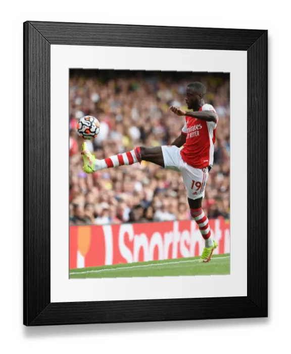 Framed Print : Arsenal's Nicolas Pepe in Action against Norwich City - Premier League 2021-22