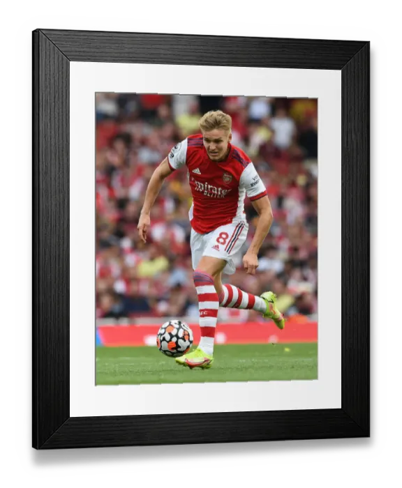 Framed Print : Arsenal's Martin Odegaard Shines in Premier League Clash Against Norwich City Framed Print : Arsenal's Martin Odegaard Shines in Premier League Clash Against Norwich City
