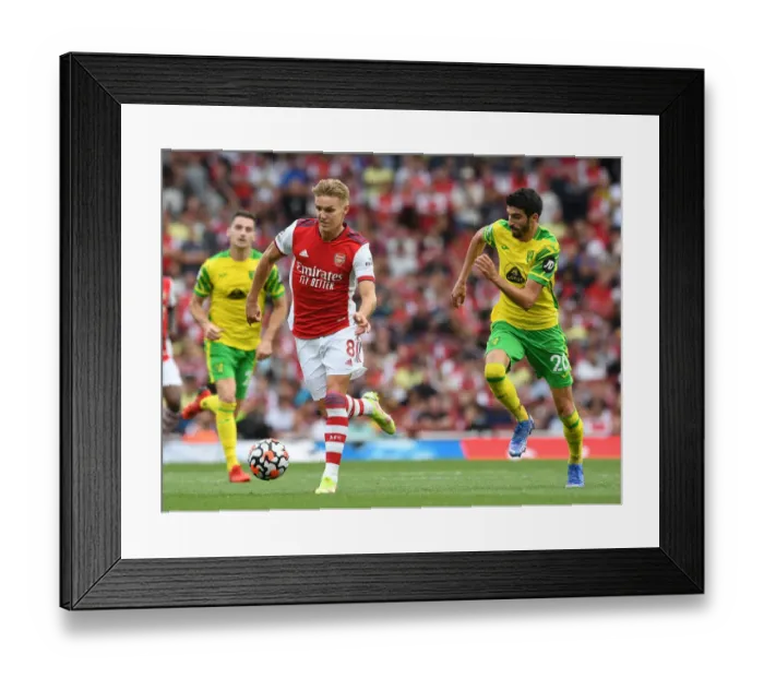 Framed Print : Arsenal's Odegaard Clashes with Norwich's Lees-Melou: A Premier League Showdown at Emirates Stadium Framed Print : Arsenal's Odegaard Clashes with Norwich's Lees-Melou: A Premier League Showdown at Emirates Stadium