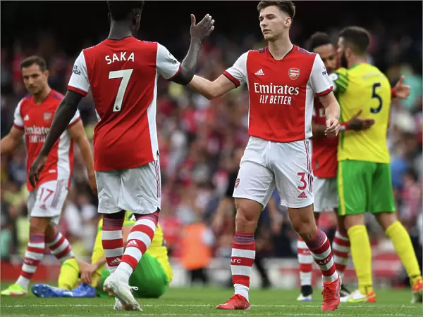 Arsenal's Tierney and Saka in Action: Arsenal vs Norwich City, Premier League 2021-22