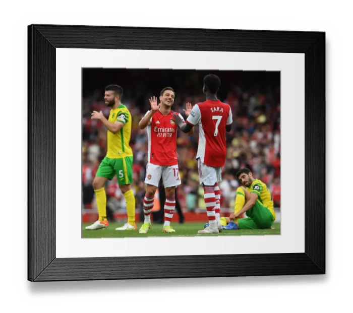 Framed Print : Arsenal's Cedric Soares and Bukayo Saka Celebrate Victory Over Norwich City Framed Print : Arsenal's Cedric Soares and Bukayo Saka Celebrate Victory Over Norwich City