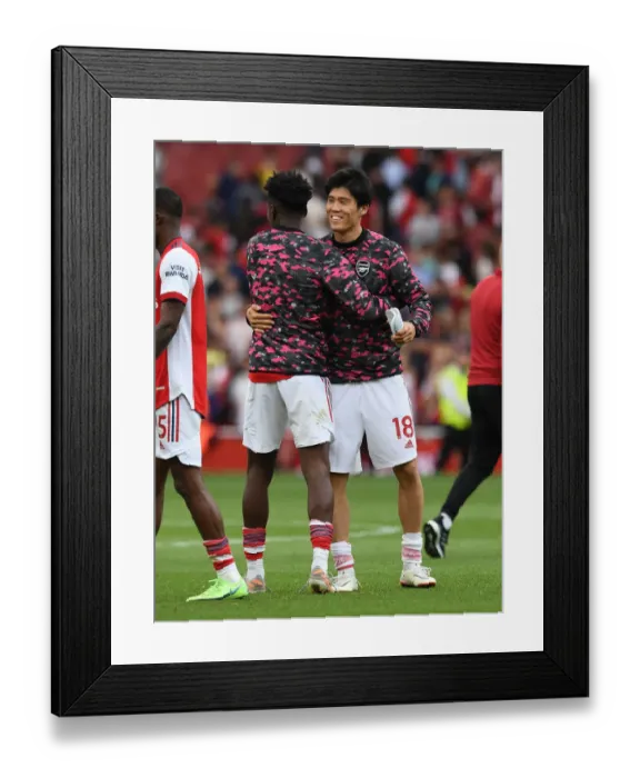 Framed Print : Arsenal's Tomiyasu and Lokonga Celebrate Victory Over Norwich City