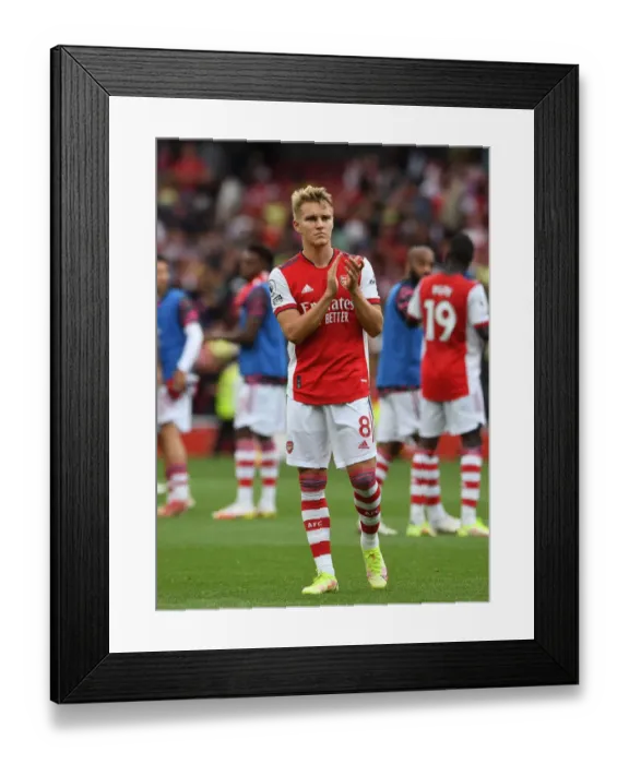 Framed Print : Arsenal's Martin Odegaard Celebrates with Fans after Arsenal v Norwich City Win