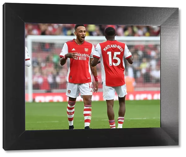 Arsenal's Aubameyang and Maitland-Niles Celebrate Victory over Norwich City