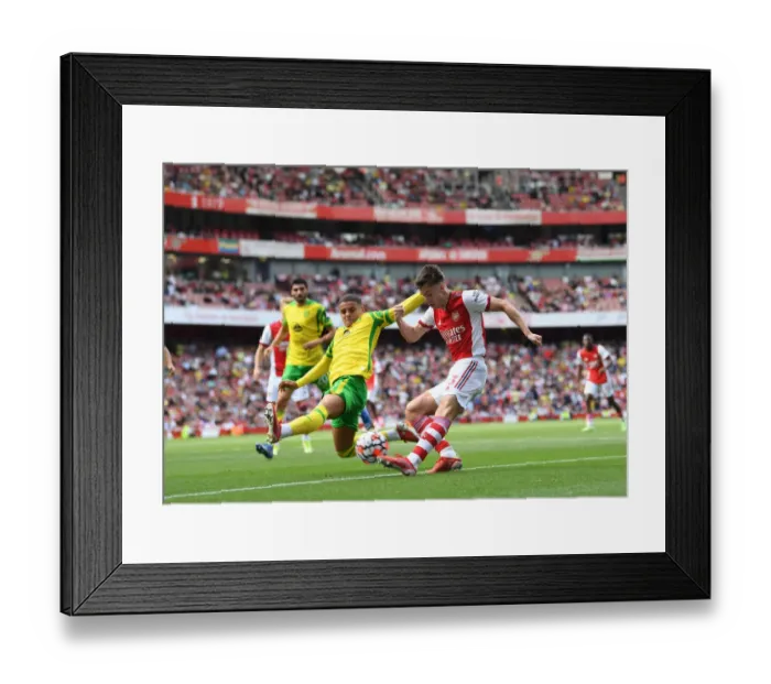 Framed Print : Arsenal's Kieran Tierney vs. Norwich's Max Aarons: A Premier League Battle at Emirates Stadium