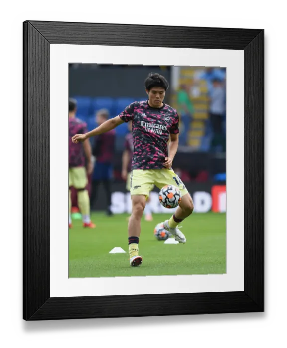 Framed Print : Tomiyasu Ready: Arsenal Star Gears Up for Burnley Clash in Premier League 2021-22