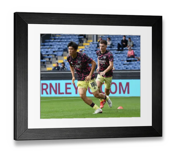 Framed Print : Arsenal's Tomiyasu Gears Up for Burnley Clash in Premier League (2021-22) Framed Print : Arsenal's Tomiyasu Gears Up for Burnley Clash in Premier League (2021-22)