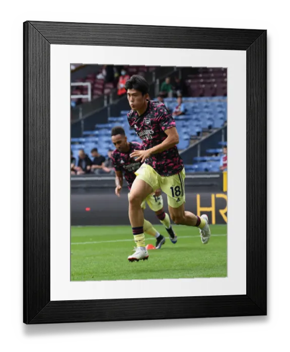 Framed Print : Tomiyasu Readies for Burnley Battle: Arsenal's Defender in Focus before Premier League Clash