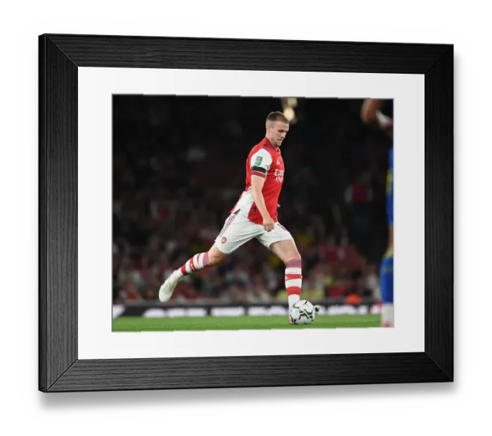 Framed Print : Rob Holding in Action: Arsenal's Defensive Masterclass vs. AFC Wimbledon