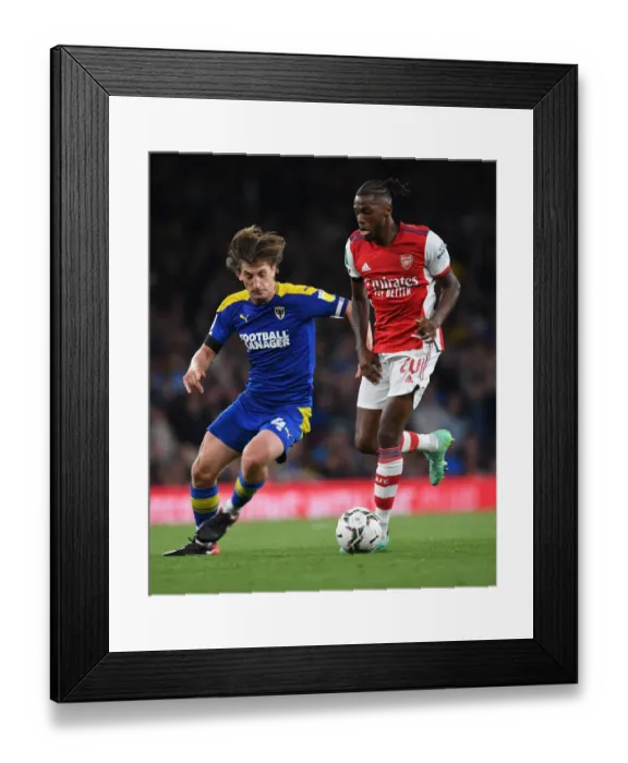 Framed Print : Nuno Tavares vs. Alex Woodyard: Arsenal's Defensive Battle in Carabao Cup Clash Against AFC Wimbledon