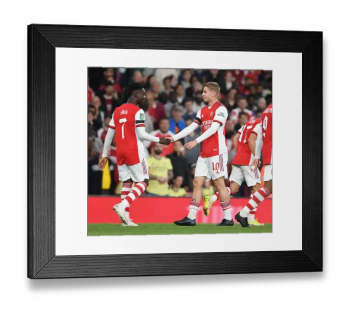 Framed Print : Smith Rowe and Saka in Jubilant Moment as Arsenal Scores Three against AFC Wimbledon