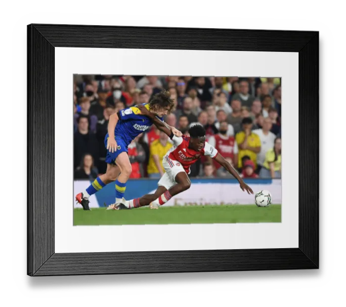 Framed Print : Arsenal's Sambi Outmaneuvers Wimbledon's Woodyard in Carabao Cup Clash Framed Print : Arsenal's Sambi Outmaneuvers Wimbledon's Woodyard in Carabao Cup Clash