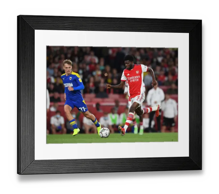 Framed Print : Thomas Partey's Powerful Performance: Arsenal's Carabao Cup Victory over AFC Wimbledon