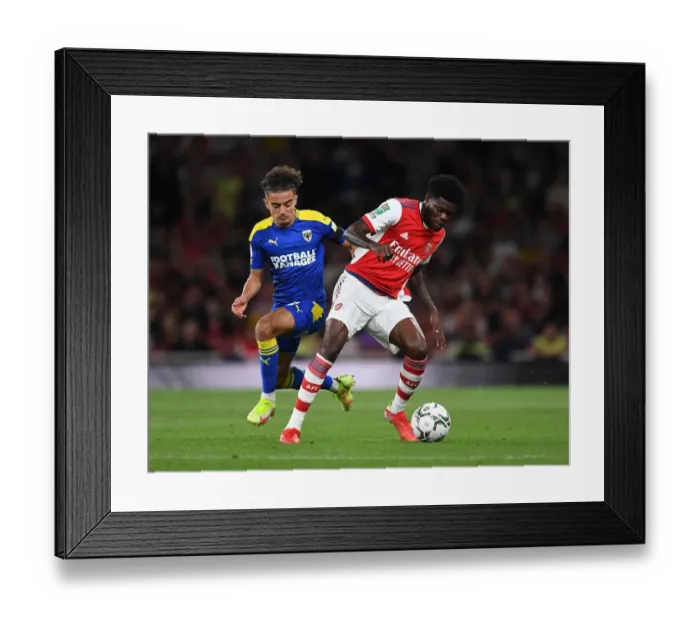 Framed Print : Thomas Partey Clashes with Ayoub Assal: Arsenal vs AFC Wimbledon in Carabao Cup