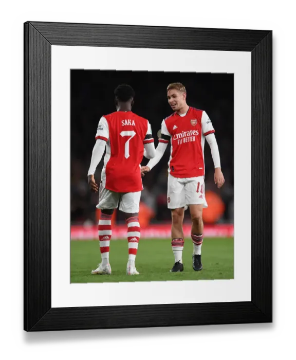 Framed Print : Arsenal's Emile Smith Rowe and Bukayo Saka Celebrate Goals in Carabao Cup Win over AFC Wimbledon