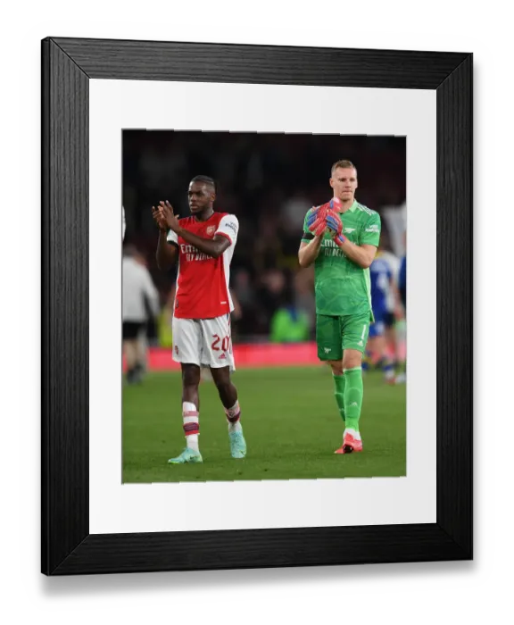 Framed Print : Arsenal Celebrate Carabao Cup Victory Over AFC Wimbledon: Nuno Tavares and Bernd Leno