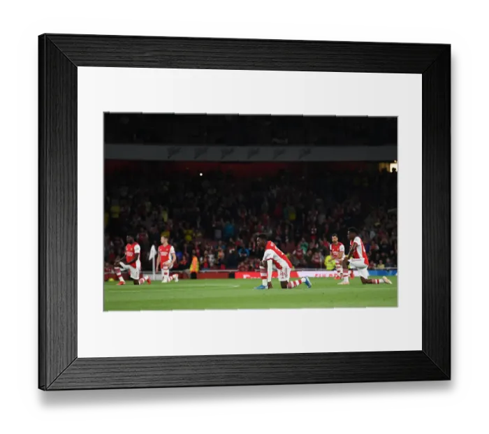 Framed Print : Arsenal's Eddie Nketiah Kneels During Carabao Cup Match vs AFC Wimbledon Framed Print : Arsenal's Eddie Nketiah Kneels During Carabao Cup Match vs AFC Wimbledon