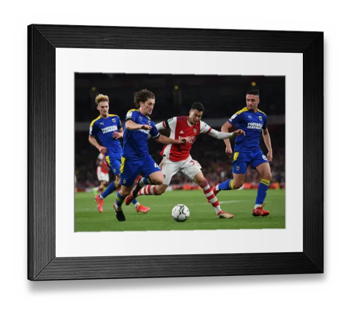 Framed Print : Martinelli Clashes with Wimbledon Duo in Arsenal's Carabao Cup Battle
