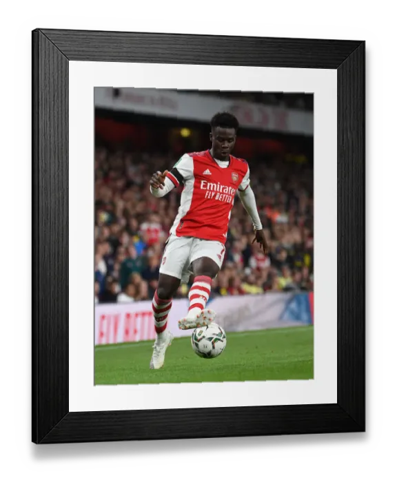 Framed Print : Bukayo Saka in Action: Arsenal's Star Performer Against AFC Wimbledon in Carabao Cup 2021-22 Framed Print : Bukayo Saka in Action: Arsenal's Star Performer Against AFC Wimbledon in Carabao Cup 2021-22