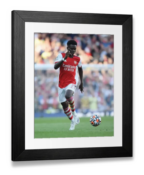 Framed Print : Bukayo Saka in Action: Arsenal vs. Tottenham Hotspur, Premier League 2021-22