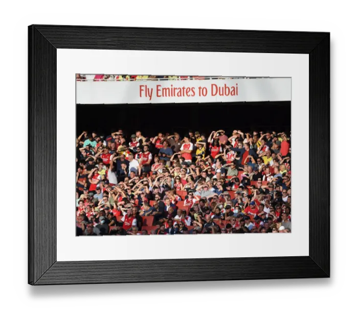 Framed Print : Arsenal vs. Tottenham: The Passionate Battle in the 2021-22 Premier League - A Sea of Arsenal Fans at Emirates Stadium