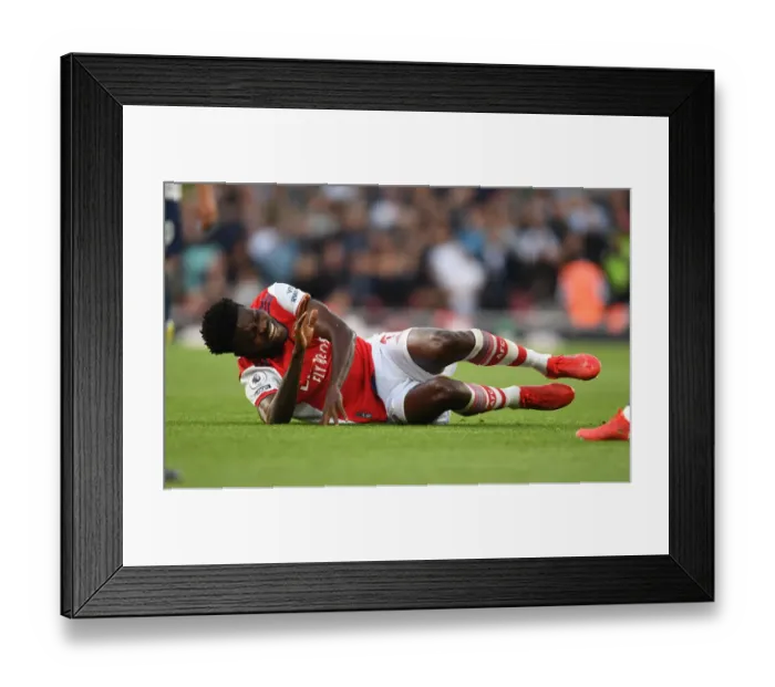 Framed Print : Intense Rivalry: Partey Fouls Highlight Arsenal vs. Tottenham Clash in Premier League