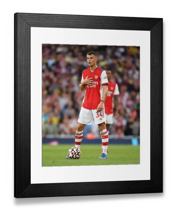 Framed Print : Granit Xhaka: In Action for Arsenal Against Tottenham Hotspur in the Premier League 2021-22
