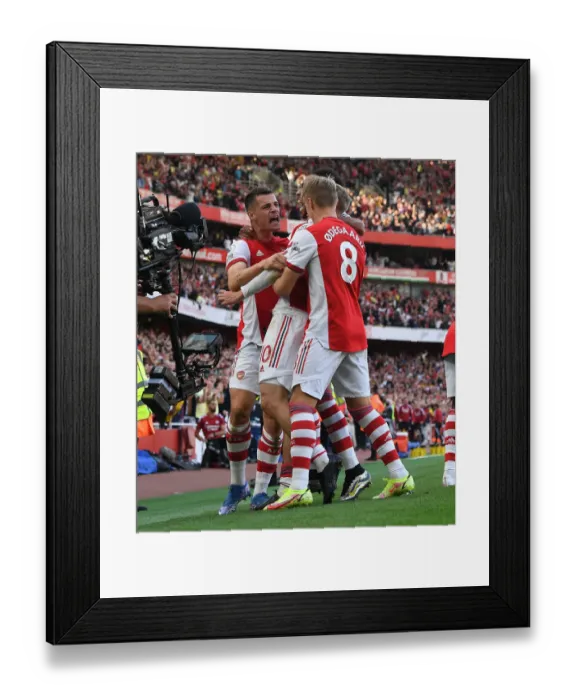 Framed Print : Arsenal's Emile Smith Rowe Scores First Goal in Derby Win Against Tottenham Framed Print : Arsenal's Emile Smith Rowe Scores First Goal in Derby Win Against Tottenham
