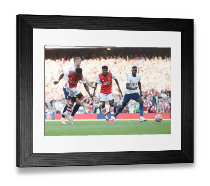 Framed Print : Saka Scores the Winner: Arsenal's Thrilling Victory over Tottenham in the 2021-22 Premier League Framed Print : Saka Scores the Winner: Arsenal's Thrilling Victory over Tottenham in the 2021-22 Premier League