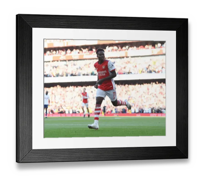 Framed Print : Bukayo Saka's Hat-trick: Arsenal's Thrilling Victory Over Tottenham in the 2021-22 Premier League