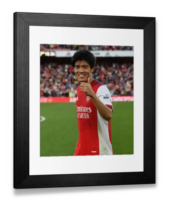 Framed Print : Arsenal's Derby Triumph: Tomiyasu Scores the Winner against Tottenham Framed Print : Arsenal's Derby Triumph: Tomiyasu Scores the Winner against Tottenham