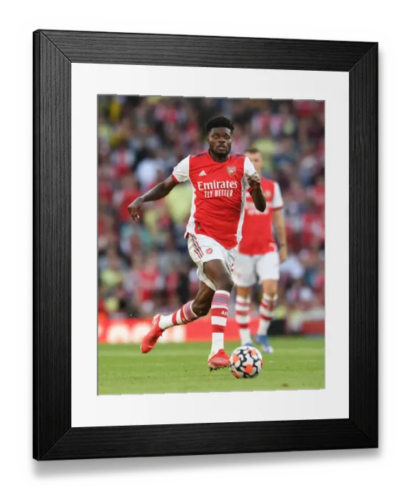 Framed Print : Arsenal's Thomas Partey Faces Off Against Tottenham in Premier League Clash Framed Print : Arsenal's Thomas Partey Faces Off Against Tottenham in Premier League Clash