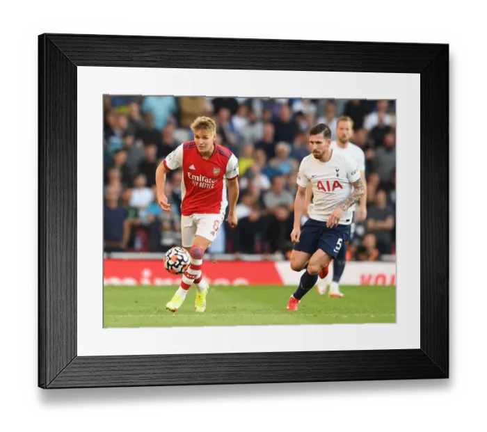 Framed Print : Arsenal vs. Tottenham: Martin Odegaard and Pierre-Emile Hojbjerg Clash in the Premier League Framed Print : Arsenal vs. Tottenham: Martin Odegaard and Pierre-Emile Hojbjerg Clash in the Premier League