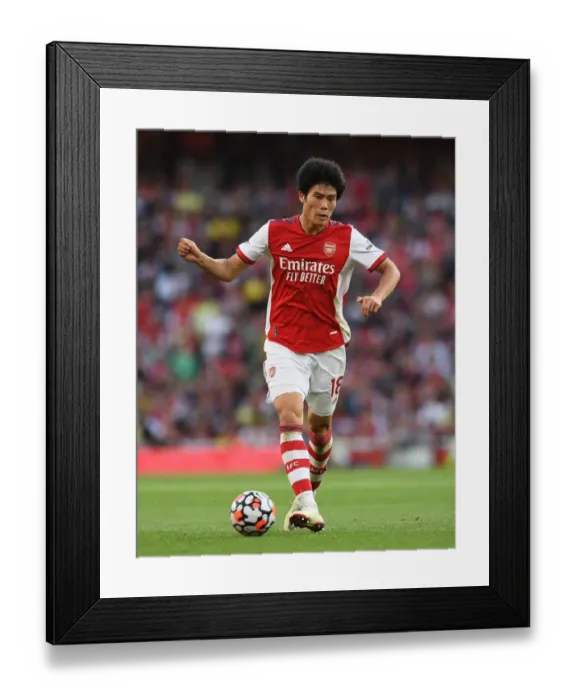 Framed Print : Tomiyasu's Unyielding Performance: Arsenal vs. Tottenham Premier League Clash