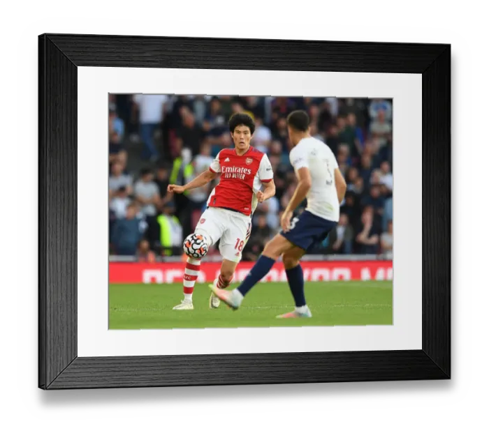 Framed Print : Arsenal vs. Tottenham: Tomiyasu in Action at the Emirates Stadium - Premier League 2021-22